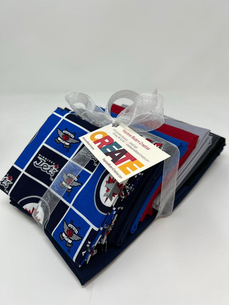 Home Game Quilt Kit featuring Home Quarter by Highway 10 Designs and the Winnipeg Jets!